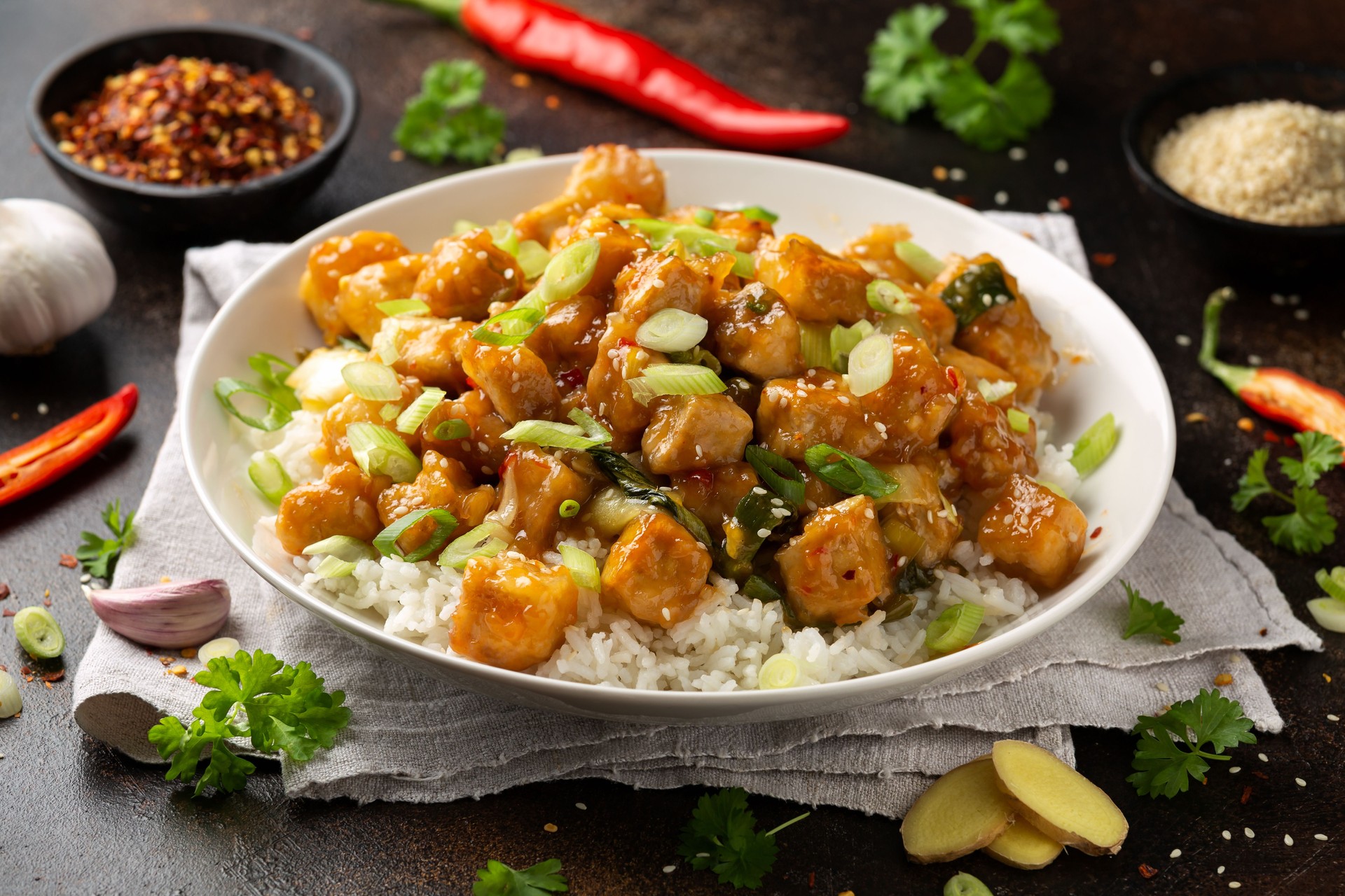 General Tso Tofu with rice, green onion and pak choi. Asian Vegan Food