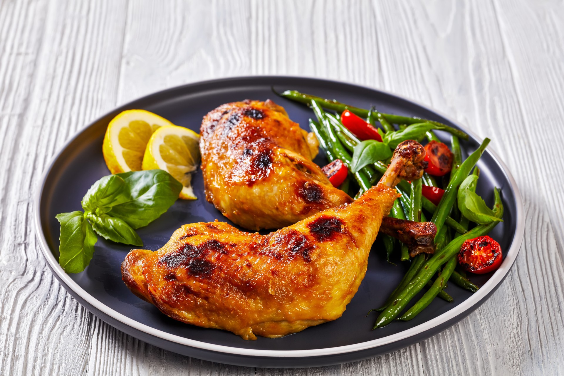 juicy roast chicken legs with green beans salad